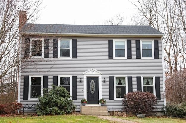 American house with a personalized entry door, highlighting the importance of choosing doors and windows with matching designs.