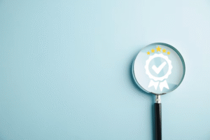 Certification icon illustrated with a magnifying glass, highlighting the importance of energy-efficient window certifications.