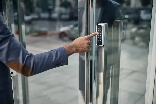 Man standing by the door typing in a password to enter, representing the importance of security windows and doors