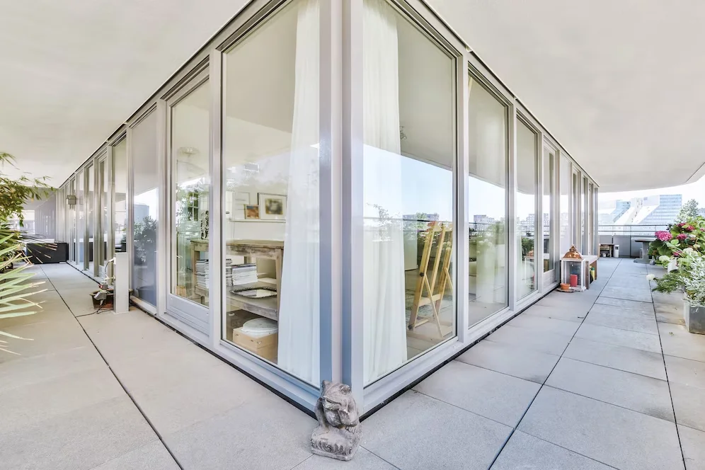 Balcony of a commercial space, representing the importance of choosing the best materials for commercial windows and doors.